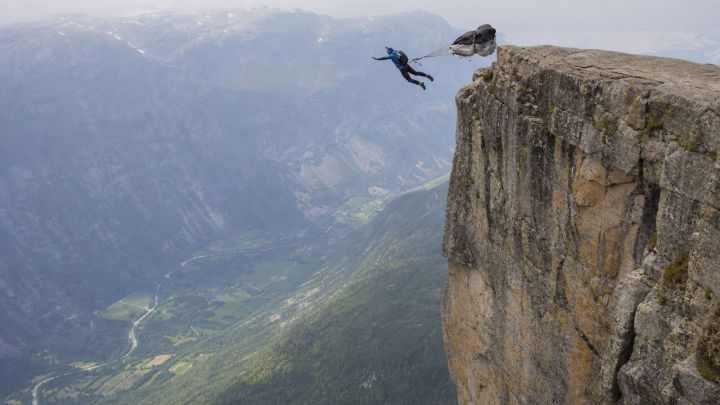 Base Jumping Off a Sheer Cliff: The Ultimate Adrenaline Rush