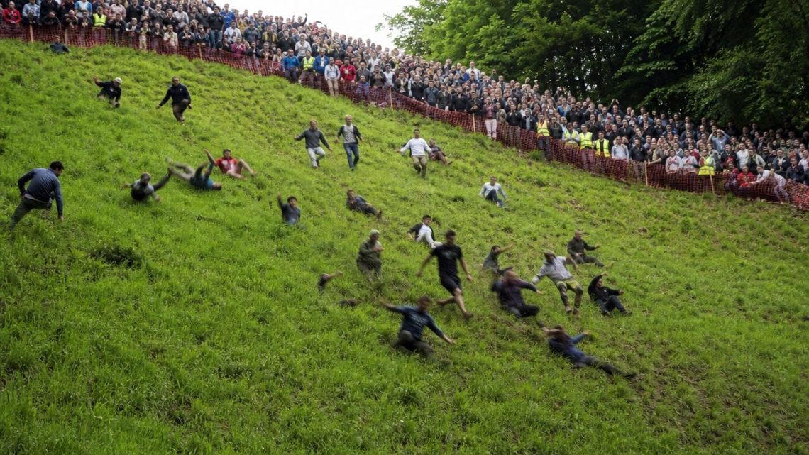 Cheese Rolling: Chasing a Wheel of Gloucester Down a Hill