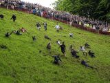 Cheese Rolling: Chasing a Wheel of Gloucester Down a Hill
