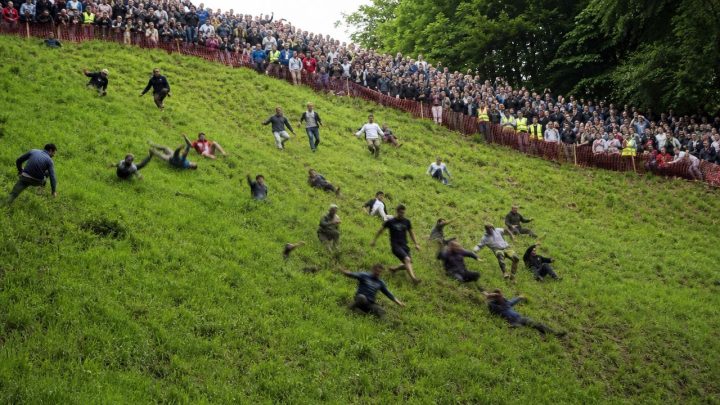 Cheese Rolling: Chasing a Wheel of Gloucester Down a Hill